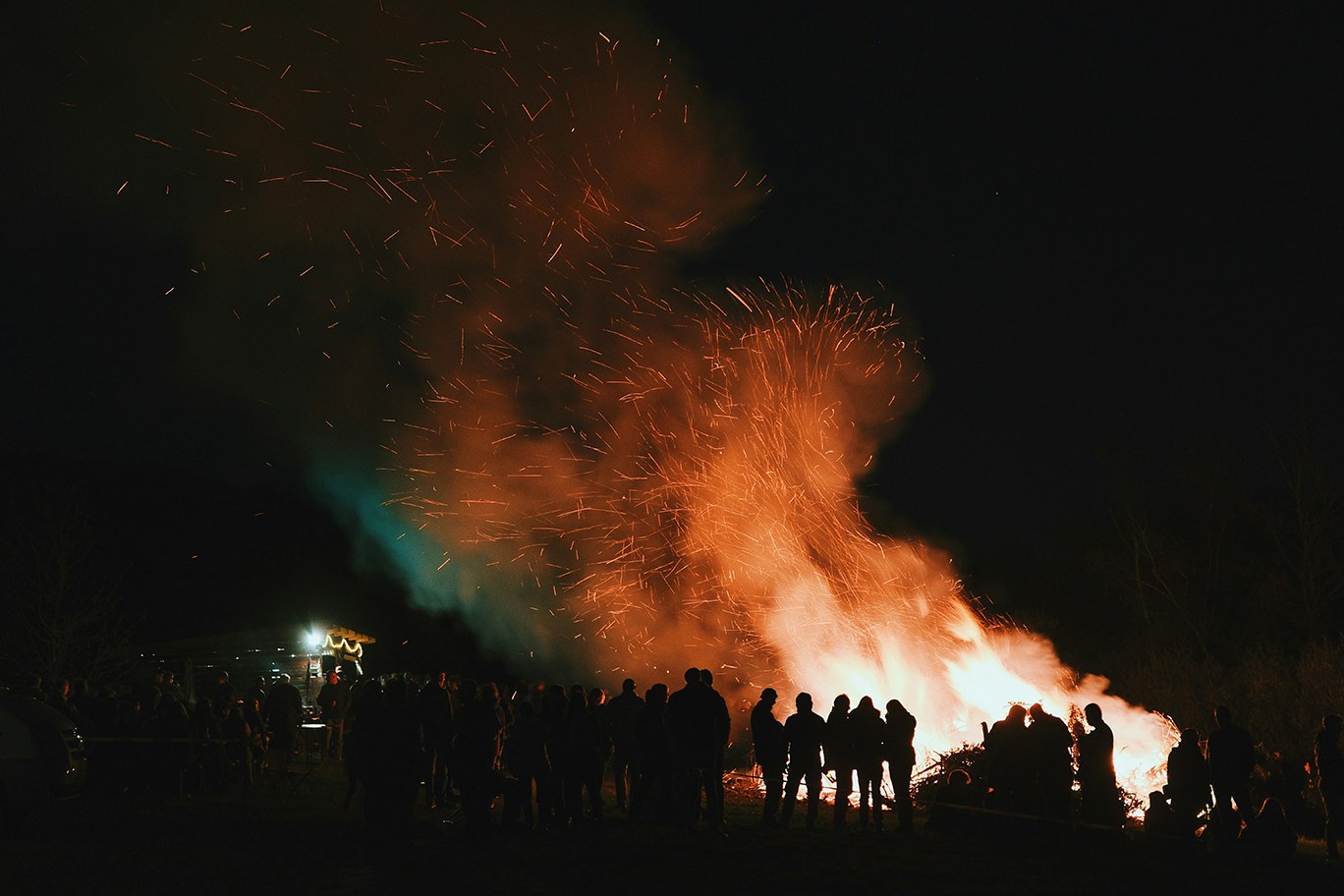 Dialogue — people around a night fire.